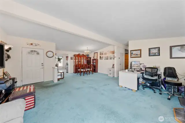 Looking into your formal dining room, can walk to the kitchen with eating space or down the hall to the rooms.