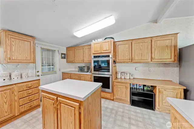 The island offers not only extra counter space but storage space for those big pots and pans.