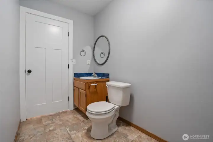 lower restroom with washer & dryer hookup.