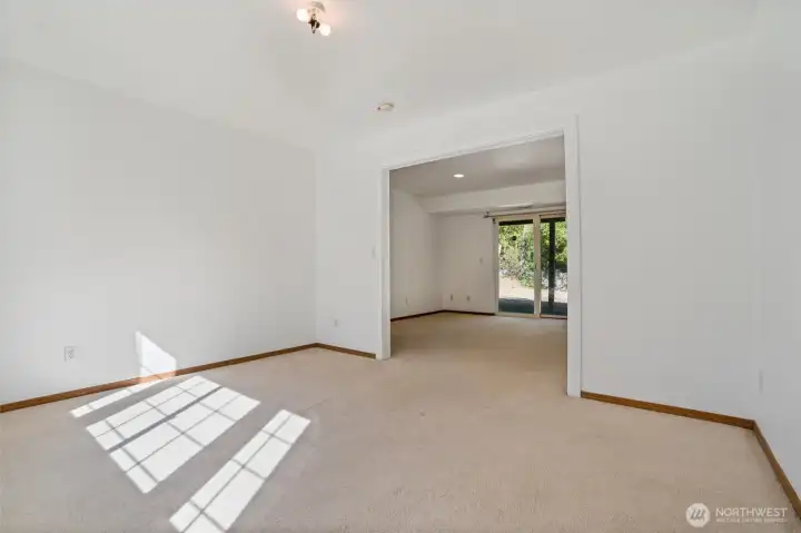 Lower additional flex room can be an office space or playroom. Perfect for storage or hobby room with a large window overlooking the front of the home.
