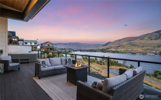 The views stretch far and wide in both directions. Downlake to the bridge into Chelan, the town and the mountains beyond..