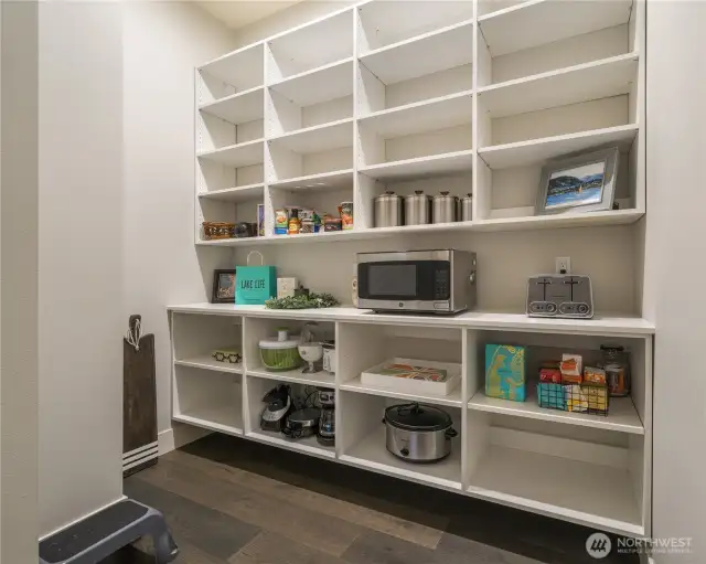 And in the corner, a dream walk in pantry! Outlets above the main shelf mean you can hide some appliances from use and keep your main kitchen stream line.
