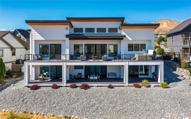 Beautiful shot of the back of the house. Low maintenance and safe borders around the property.