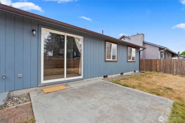 This patio off the rear of the home is ready for your barbecue and some outdoor furniture!