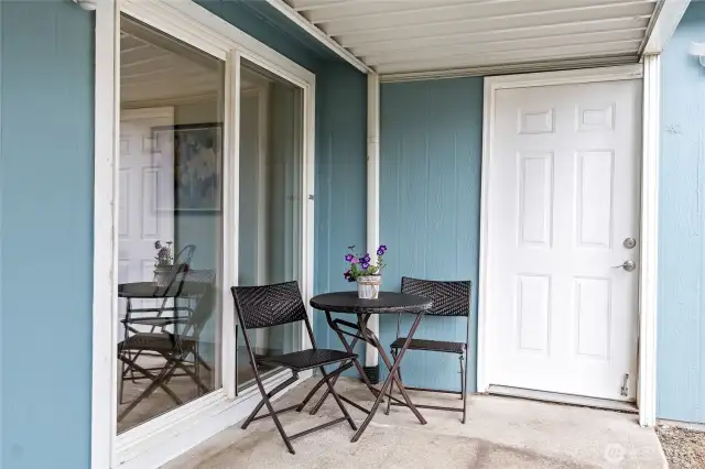 Patio, slider to house, door to garage
