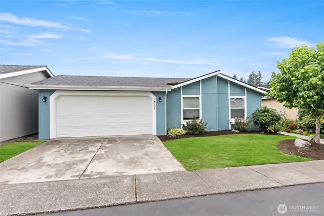 2 car garage and 2 spaces in driveway