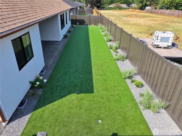 Turf lawn with zero-scape plantings