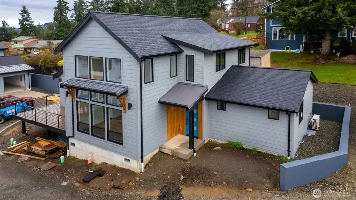 Welcome to 1110 Divine Lane - a contemporary brand new home in the Puget neighborhood. Landscaping to be completed prior to closing