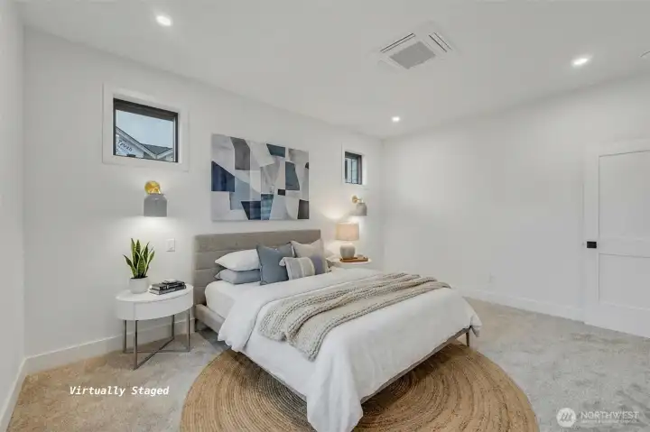 Another view of the primary bedroom