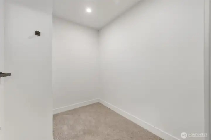 Large walk in closet for the primary bedroom.