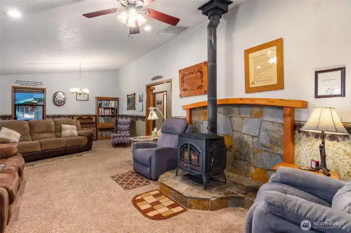 Cozy living rm with warm, relaxing wood stove for cooler days