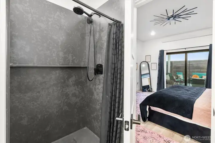 Roomy Shower extends to back wall