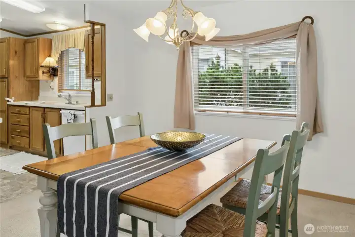 Notice the custom wood blinds throughout the home