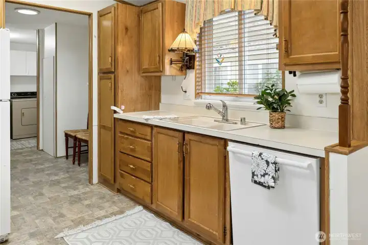 Large kitchen has all the space you'll want, with pull-outs for pantry