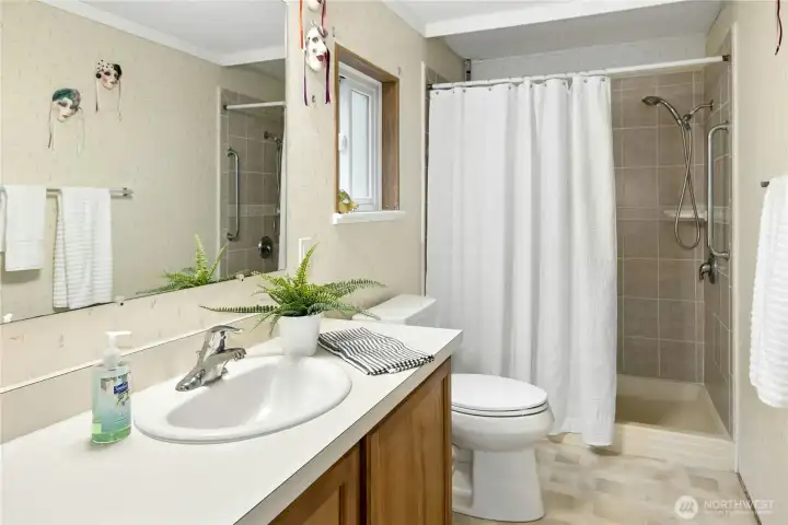 Walk-in shower is an upgrade, along with the new high-rise commode
