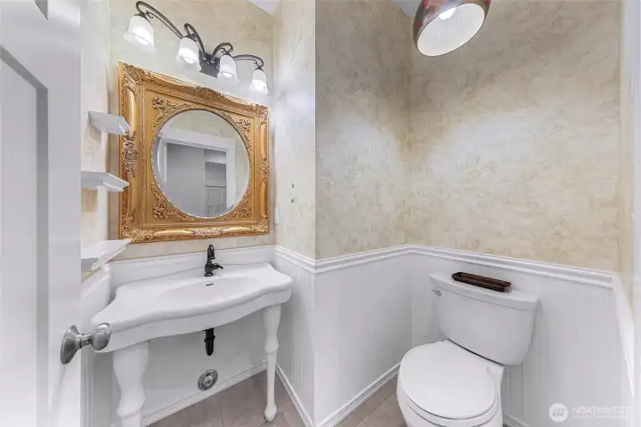 Guest half bath located on the main floor