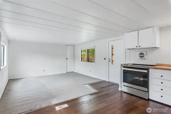 Living room and primary bedroom with .50 bath in front