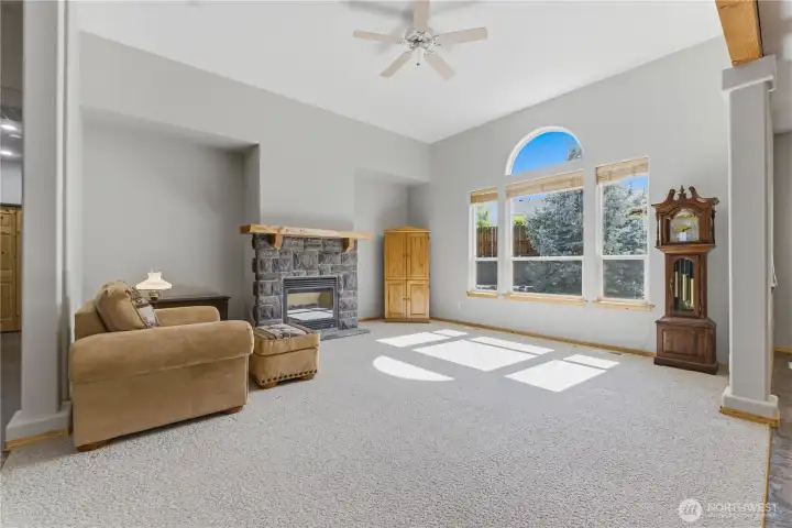 Great room with rock fireplace.