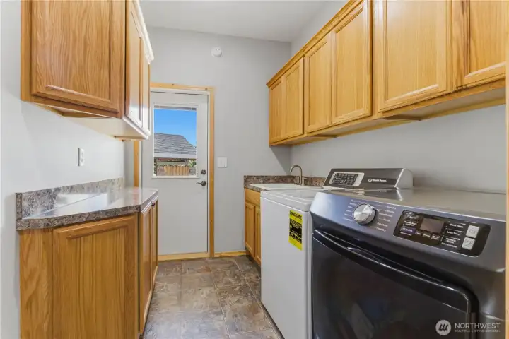Laundry room with washer/dryer included.