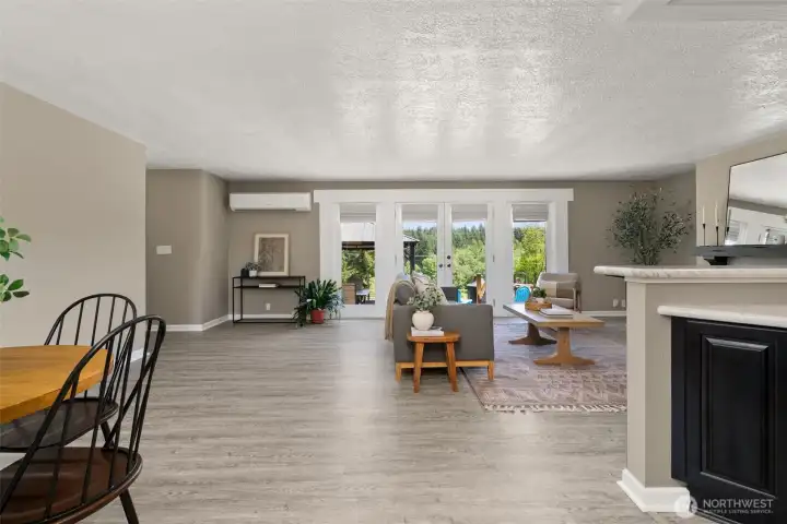 Entry into home and Great room with view out French doors leading to patio.