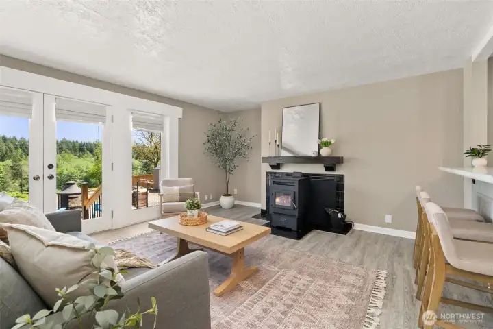 Great room with French doors leading out to patio.