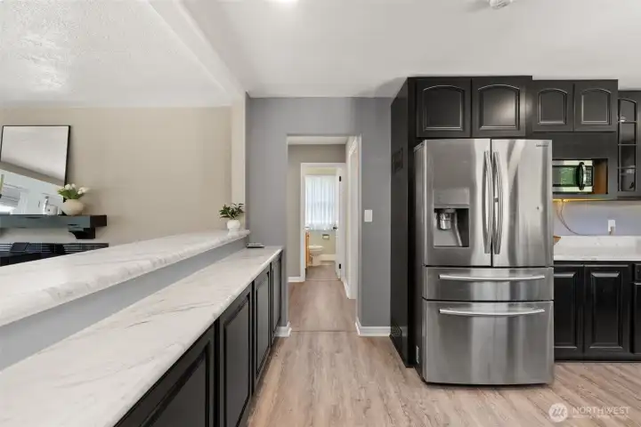 Kitchen with stainless appliances.