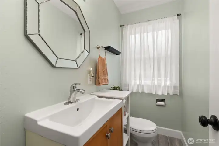 1/2 Bath located near laundry room.
