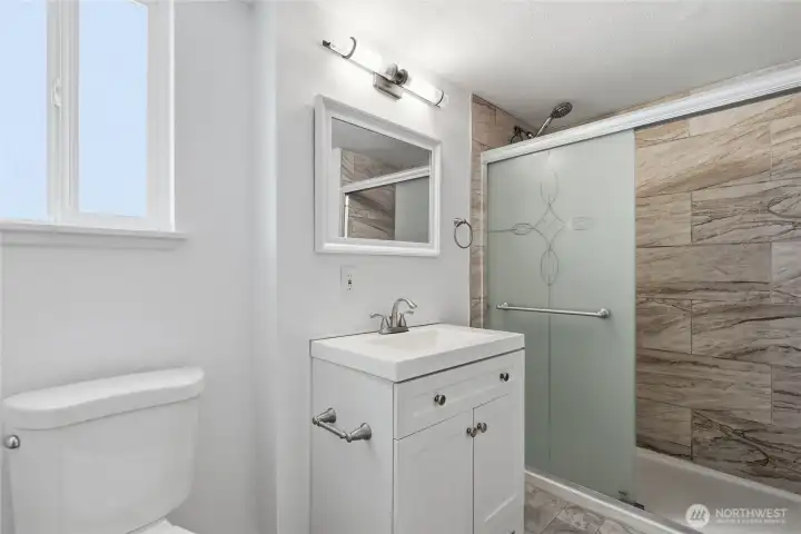 Main house: Main floor bathroom. Main house: Main floor bathroom.