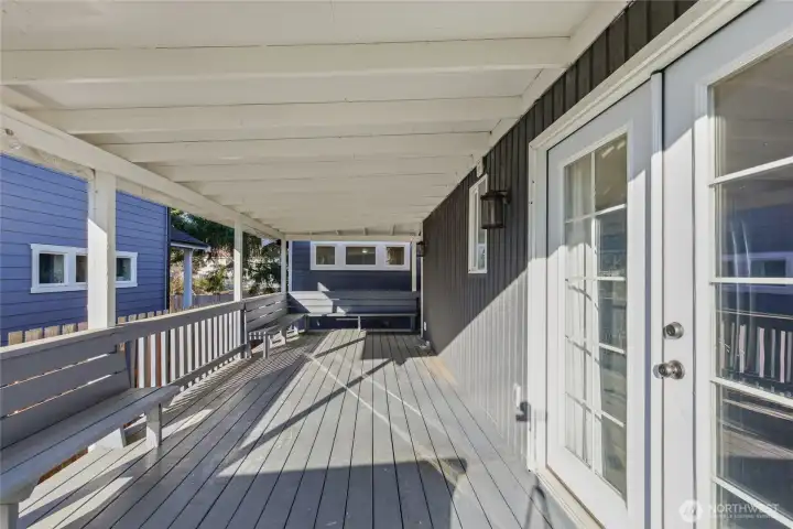 Main House: Outdoor Patio with French Doors that enter the Kitchen. Main House: Outdoor Patio with French Doors that enter the Kitchen.