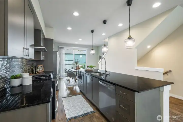 New pendant lights and a drawer microwave built into the counter top space. New pendant lights and a drawer microwave built into the counter top space.