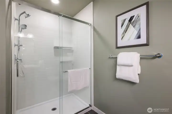 New tile surround and upgraded fixtures- and an added light in the shower! New tile surround and upgraded fixtures- and an added light in the shower!