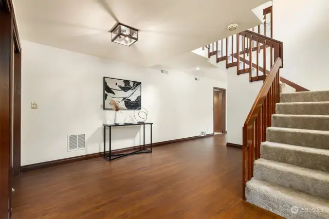 The entry way with stairs leading up to the main living area.
