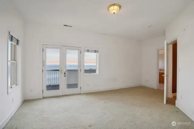 North east bedroom with views, deck and bathroom