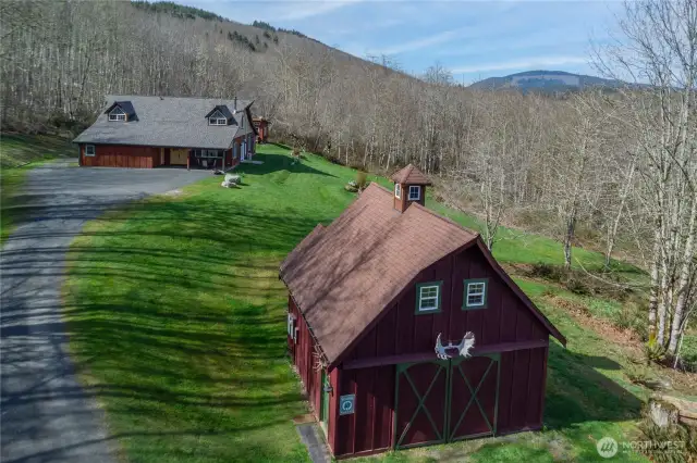 Stunning custom built home and shop on 20 private acres, with an artesian well, generator, mt views + more.