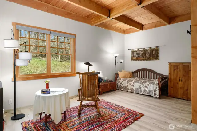 The spacious primary bedroom has dual deep closets. All windows have screens and new blinds.