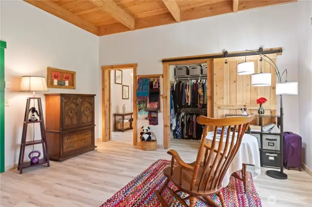 The primary bedroom space has two large walk-in closets and a spacious 5-piece private bathroom.