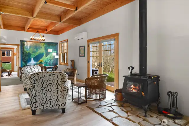 Blaze King brand wood stove, new vinyl plank floors, Douglas Fir ceiling & trim, all new blinds throughout.
