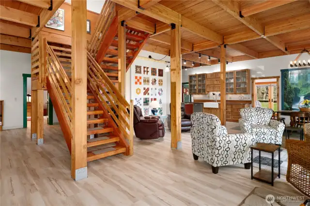 The great room is spacious and beautiful, built with local Douglas Fir.