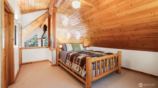 The loft/second bedroom features two closets and an attached 3/4 bath