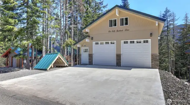 Newly built detached 2 car garage with 9' doors. 525 sqft of work space with access to 525 sqft unfinished loft and 565 sqft unfinished room below.