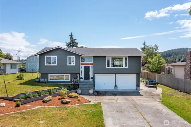 This home boasts brand-new paint, siding, windows, roof, gutters, and beautifully updated front landscaping—offering fresh curb appeal and modern style. With room to park your RV/Boat.