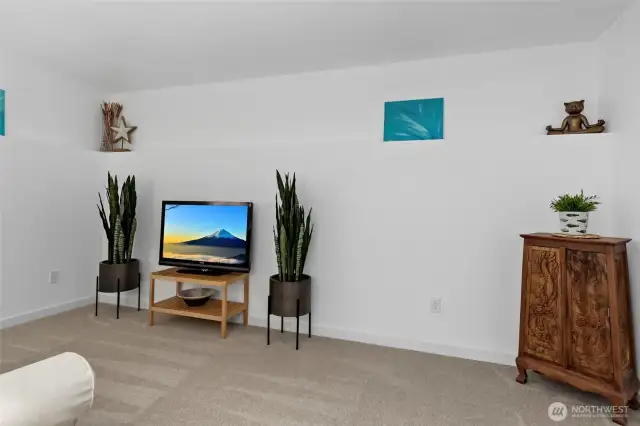 The family room offers a generous and versatile space, ideal for a media room, library, additional guest sleeping area, or a playroom—designed to adapt seamlessly to your needs.