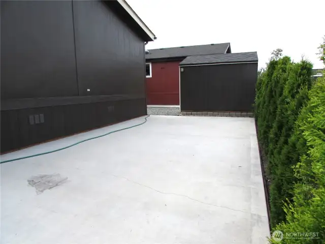 SEMI-PRIVATE 15' X 30' PATIO, SHED W/ POWER & ACCESS TO FRONT OF HOME.