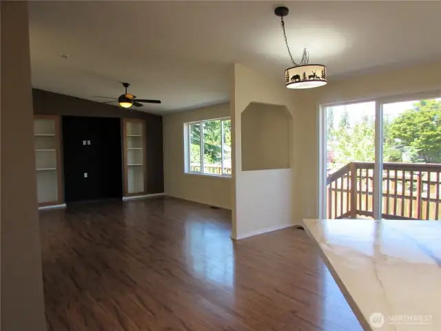 DINING AND FAMILY ROOM, SNACK BAR TO RIGHT IN KITCHEN. SLIDER GOES TO FENCED BACK YARD.