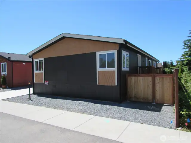 ...BACK TO THE HOME NOW..,FRONT GATE ACCESS TO SIDE YARD TO RIGHT.