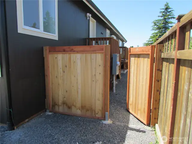 PRIVATE GATE ACCESS TO NORTH SIDE OF HOME FROM STREET.