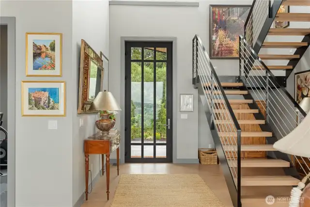 Grand Entry w/architectural steel staircase & French Oak treads