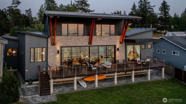 Beachside w/generous deck and yard to enjoy the outdoor living spaces