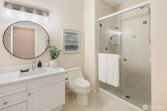 3/4 bath on main level adjacent to bedroom.