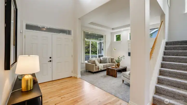 Enter to newly refinished hardwood floors, brand new carpets, vaulted ceilings and an abundance of natural light.